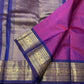 Full view of fuchsia lightweight pure silk Kanchipuram saree with royal blue varisaipet border — Idam Living