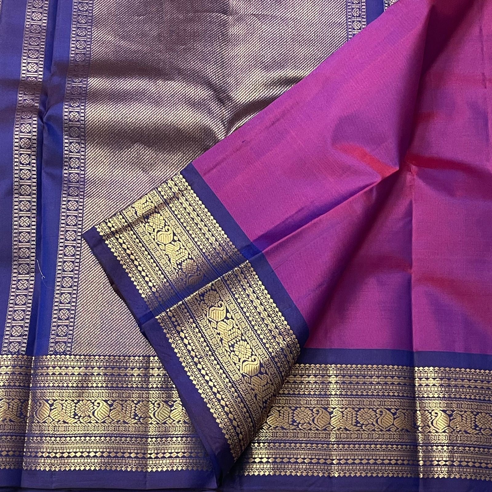 Full view of fuchsia lightweight pure silk Kanchipuram saree with royal blue varisaipet border — Idam Living
