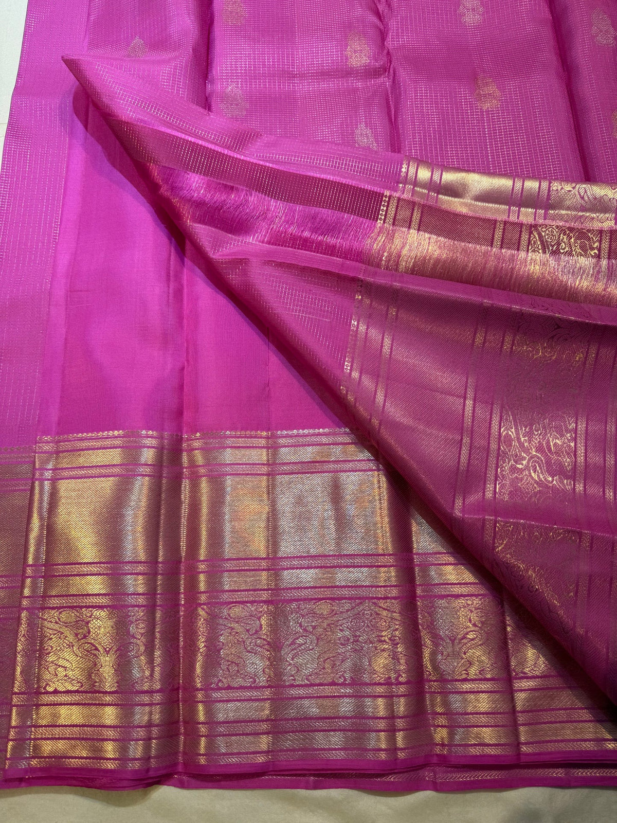 Orchid pink Pure Silk Kanjivaram saree draped, showing Sonarupa zari motifs