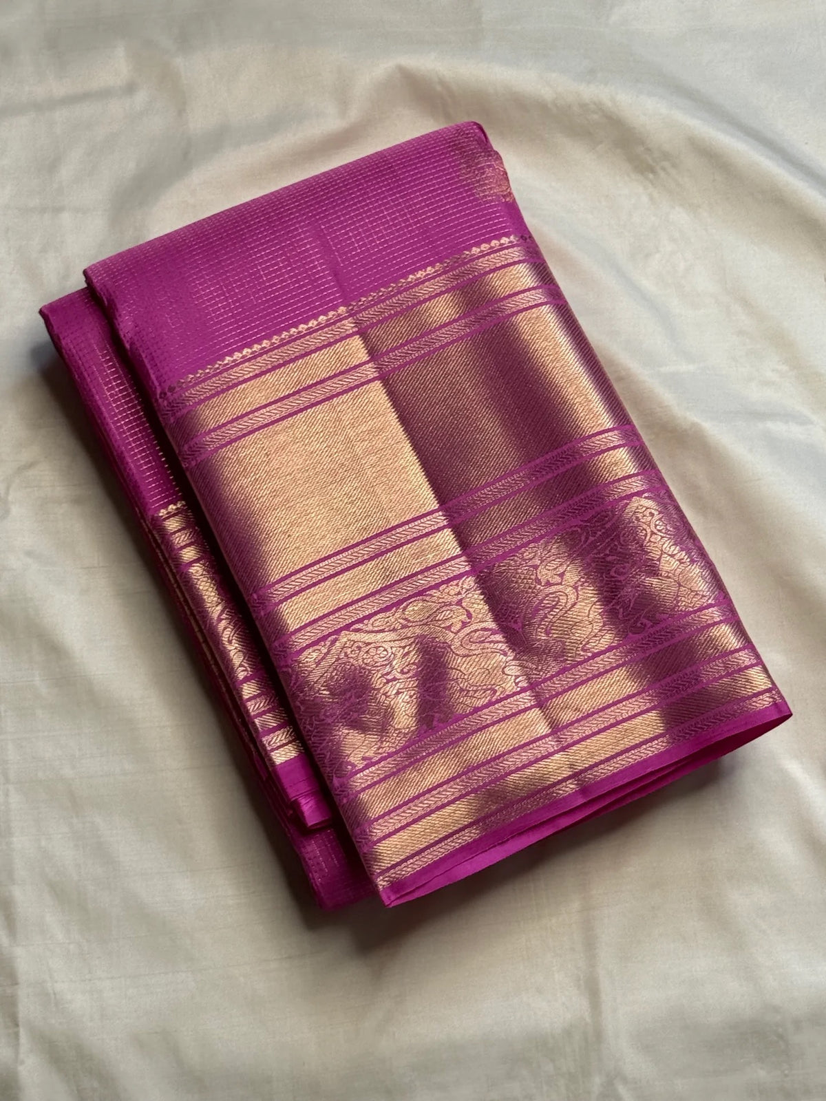 Full view of the orchid pink handwoven Pure Silk Vairaoosi saree with broad zari border