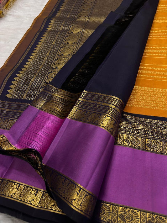 Saffron Marigold Handwoven Pure Silk Kanjipuram Korvai Saree with Orchid Purple Border and Veldhari Zari