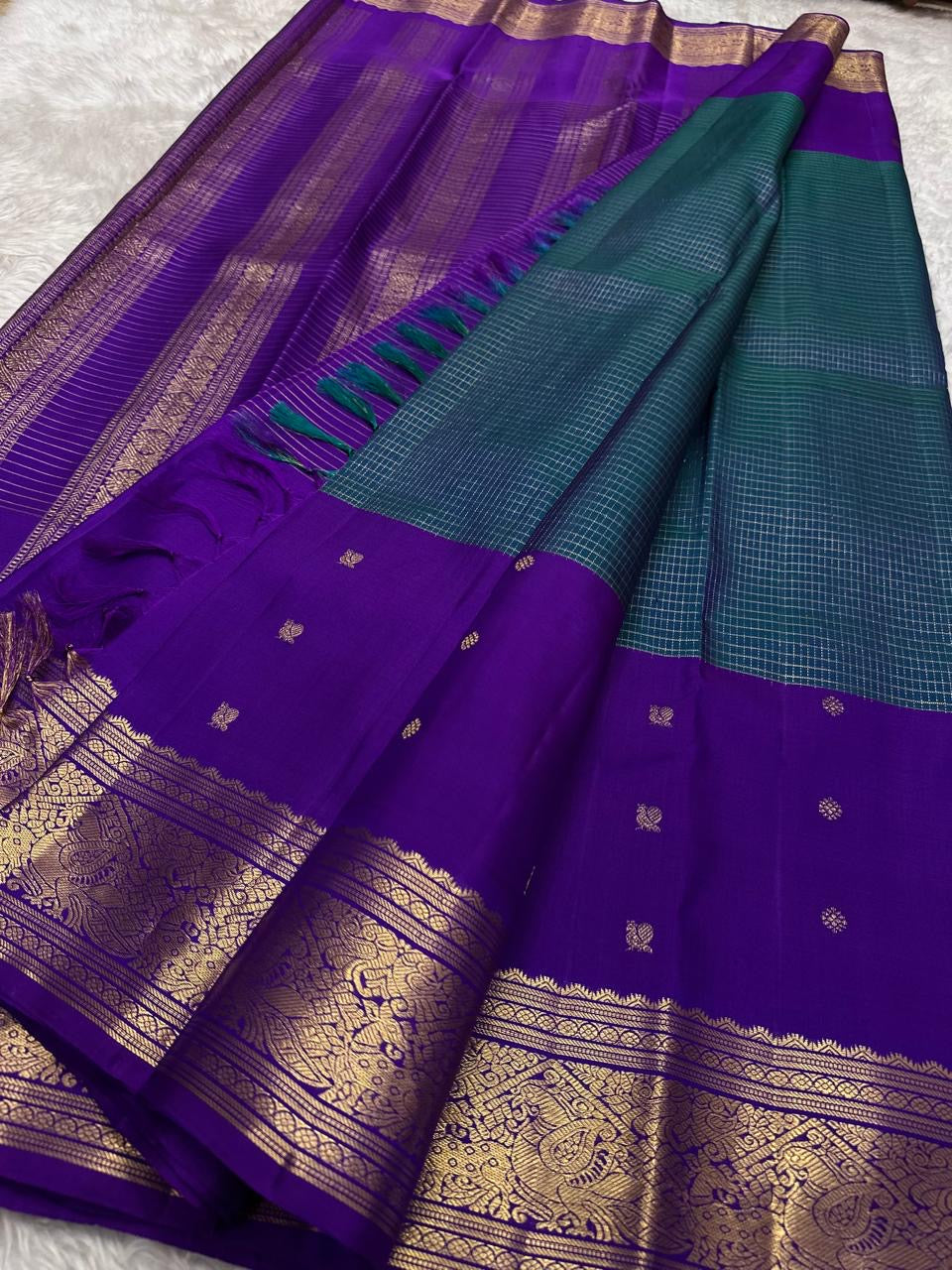 Kanchipattu silk saree in sapphire blue with orchid purple border Double Korvai weave traditional zari detail