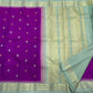 Handwoven pure silk Kanjipuram saree in orchid purple with Mayil Chakram buttas and ice blue Korvai border Silk Mark certified