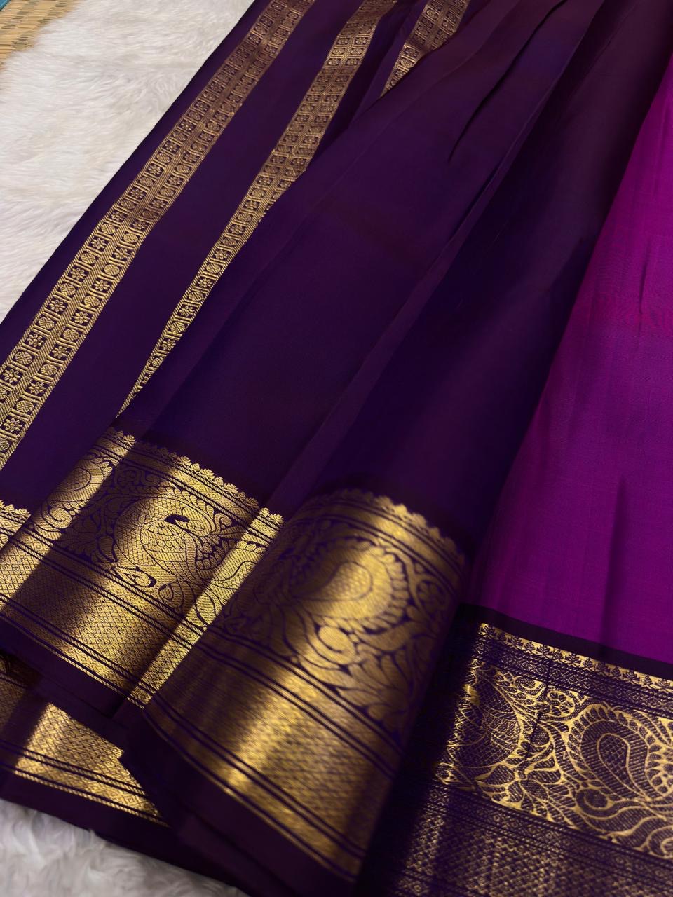 Orchid purple Kanchipuram silk saree with korvai zari butta detail