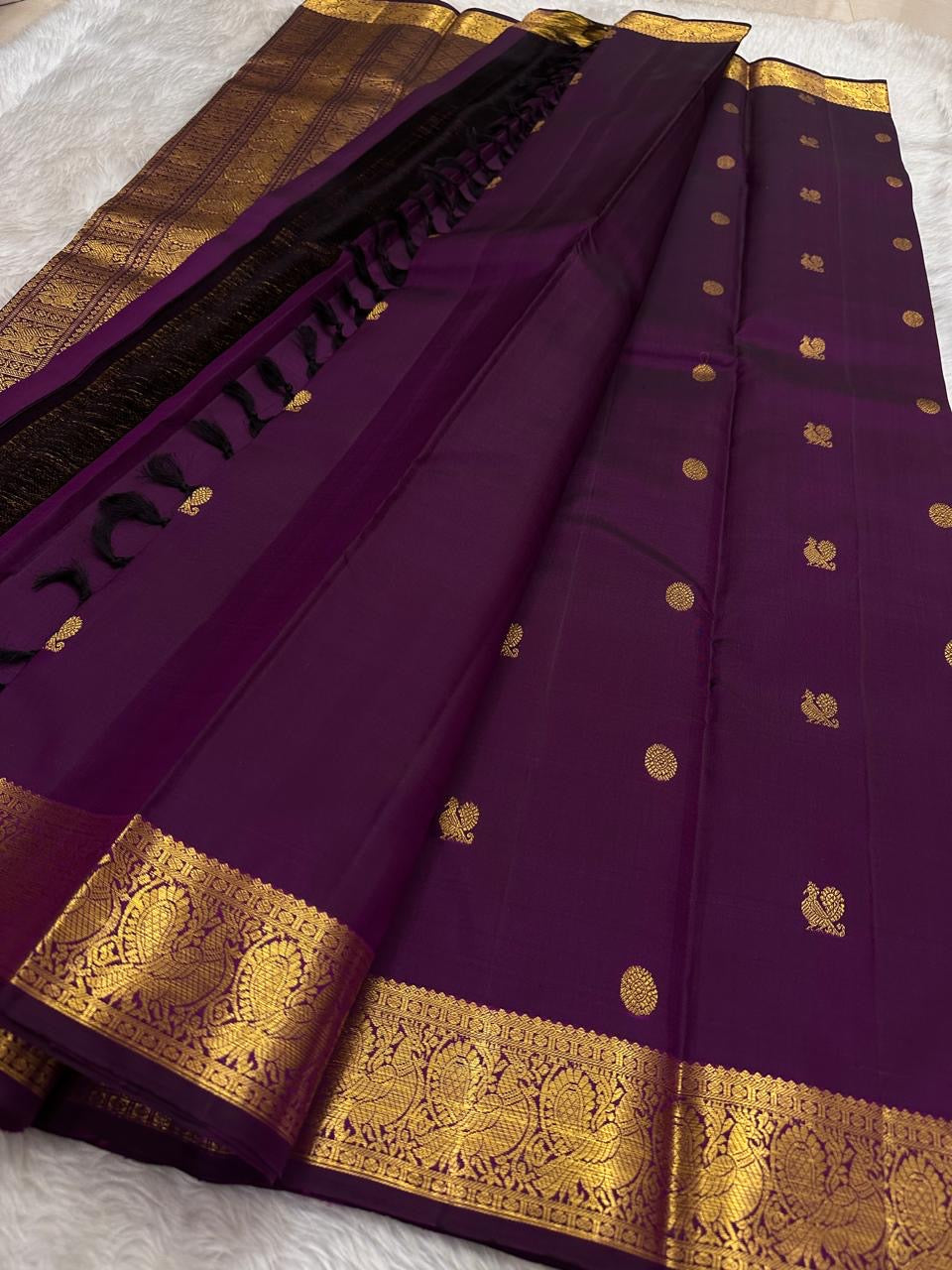 Pure silk Kanchivaram saree with elegant Annapakshi motifs woven in luminous antique gold zari