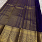 Handwoven Elephant Ambari motif woven in gold zari across the deep Arakku silk body