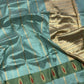 Sea glass blue and sage green Pattu Silk Chanderi saree with an ornate gold pallu