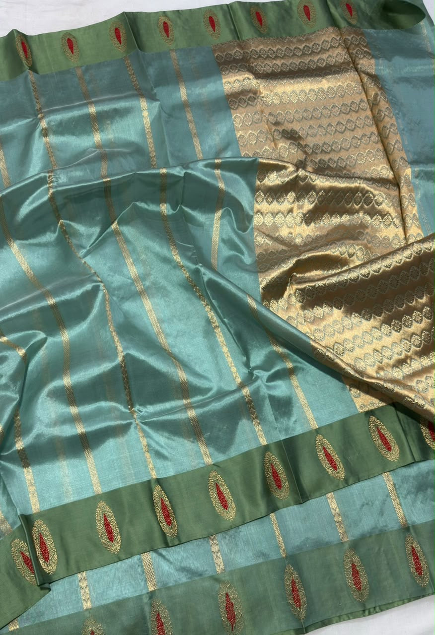 Sea glass blue and sage green Pattu Silk Chanderi saree with an ornate gold pallu