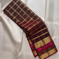 Paaku Brown pure silk Kanchipuram Zari Kattam saree with Arakku border and vivid Rani Pink Yaanai motifs.