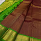 Brown pure Kancheepuram silk body filled with a small regular grid of gold-toned zari checks