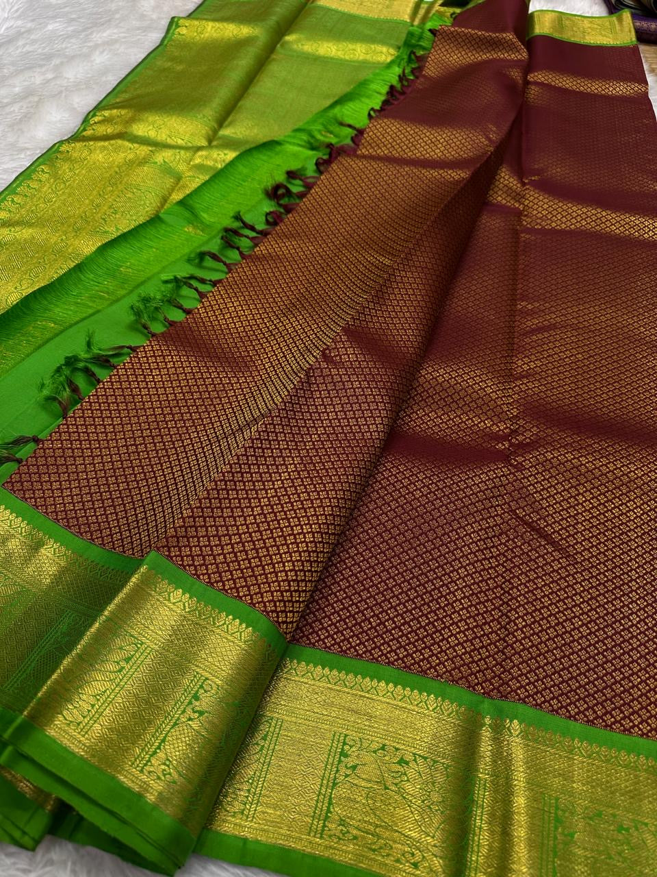 Brown pure Kancheepuram silk body filled with a small regular grid of gold-toned zari checks