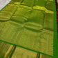 Paaku brown Zari Kattam silk with vivid green-and-gold woven pallu and repeating fine gold checks