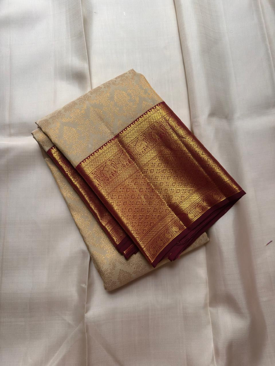 Paal Vellai pure silk Kanchipuram Korvai saree with Kumkumam Red contrast and classic gold zari border.