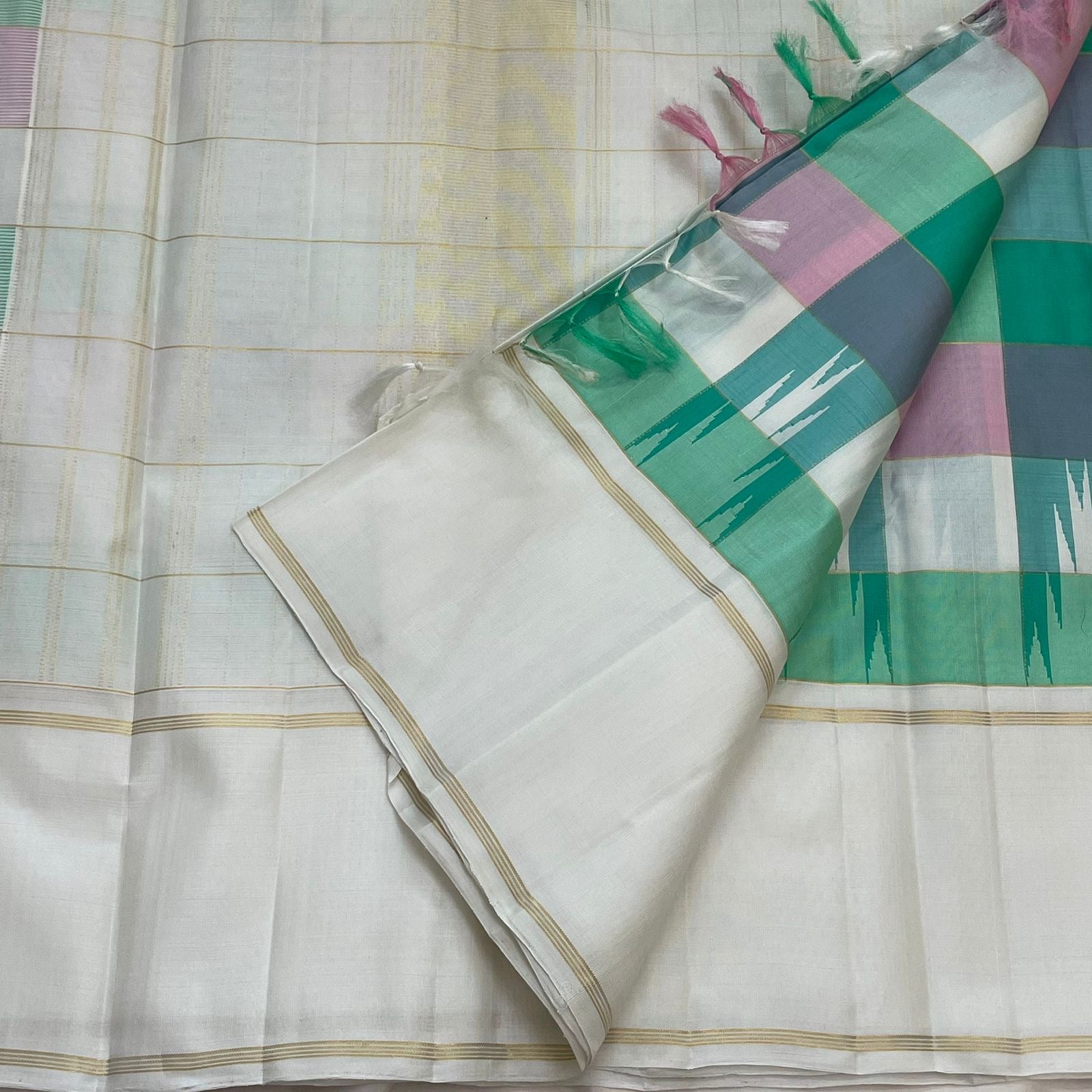 Off-white pallu of Paalum Pazhamum pure silk Kanjivaram saree with gold zari Varisaipet structure