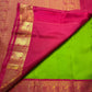 Pachai Green Kanchipuram saree with small Deep Magenta antique gold zari border