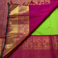 Pachai Green pure silk Kanjivaram Korvai saree with silk-thread buttas and Rani Pink antique-gold Yaanai border.