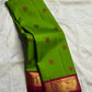 Pachai Green Handwoven Pure Silk Kanjivaram Butta saree with small Deep Magenta border