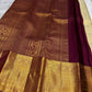 Close detail of Kumkumam Red Kanchipuram border with Pakshi-inspired gold zari and geometric framing.