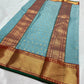 Pale blue Katan Chanderi saree with red and gold border