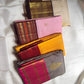 Curated Pure Silk Kanchipuram sarees including Pale Blush Pink Korvai with deep Aubergine ornamental zari border.
