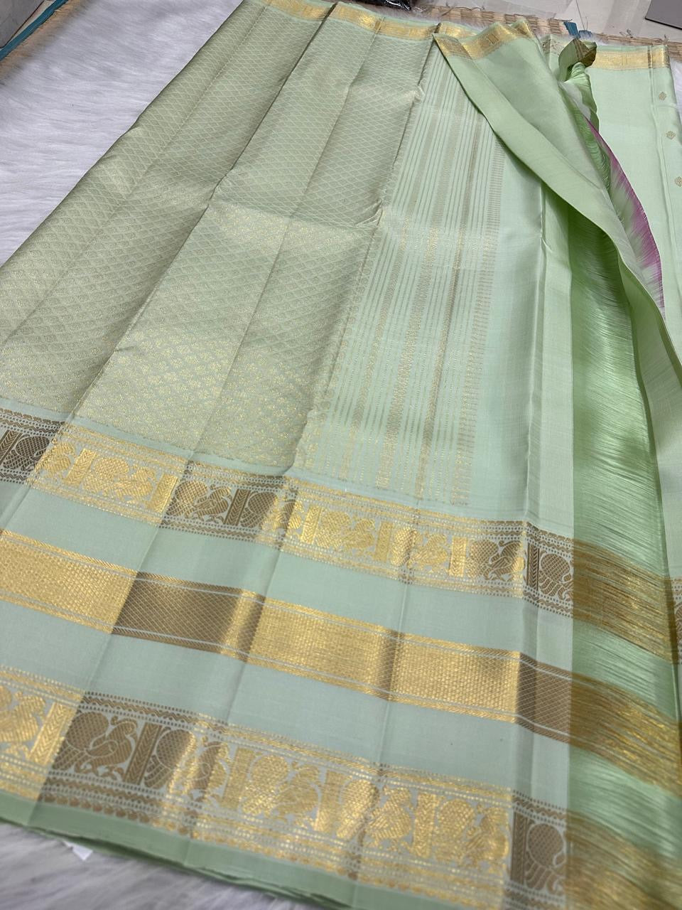 Pale Pistachio-Mint Handwoven Pure Silk Kanchipuram Saree with Gold Zari Buttas and Varisaipet Border