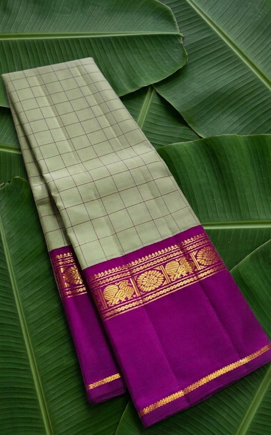 Pale green and magenta Zari Kattam Korvai Kancheepuram silk saree with Kamalam border — main product view
