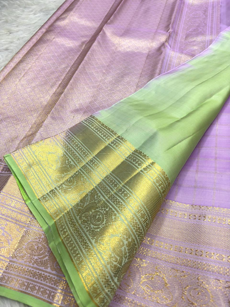 Warm Ivory and Pale Pink Lavender-undertone Zari Kattam sarees displayed with Mint Green finishing and metallic borders.