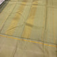 Kancheepuram pure silk saree in pale sage with bottle green contrast border and woven pallu