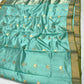 Aqua Blue handloom Katan Silk Chanderi saree draped to show the pale turquoise tone and silk lustre