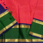 Full flat lay of pure Kanchipuram silk saree with red checked body, green border, navy pallu with vertical zari stripes, and gold zari bands.