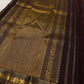 Full pallu layout showing black field with heavy gold zari weave and elephant motif border on Pure Kanchipuram silk saree, available in the USA.
