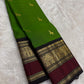 Parrot Green and Black Handwoven Pure Silk Kancheepuram Saree with Maan Butta and Zari Border