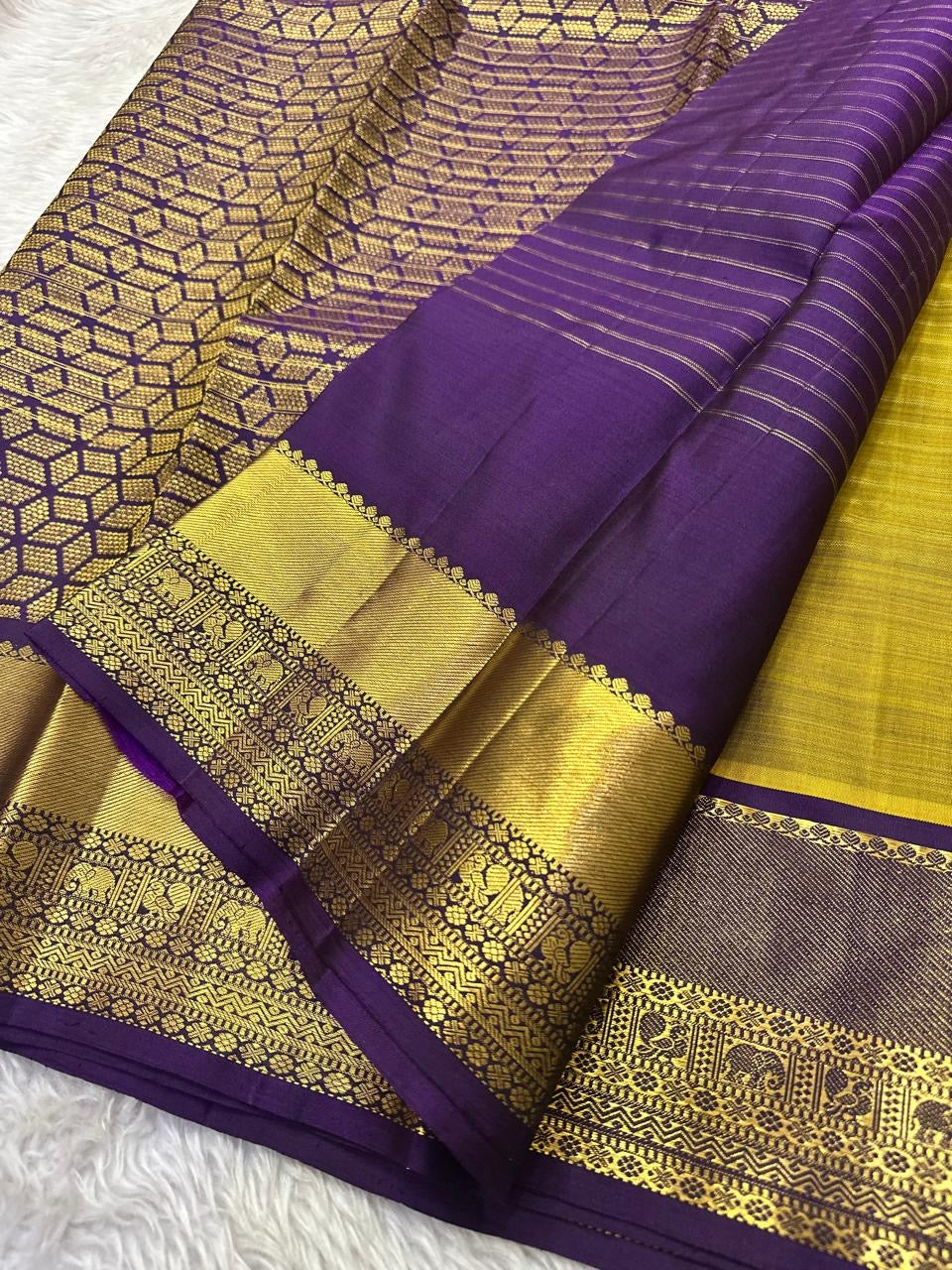 Zari Kattam weave and elephant motif detail on parrot green Kancheepuram silk saree — Idam Living