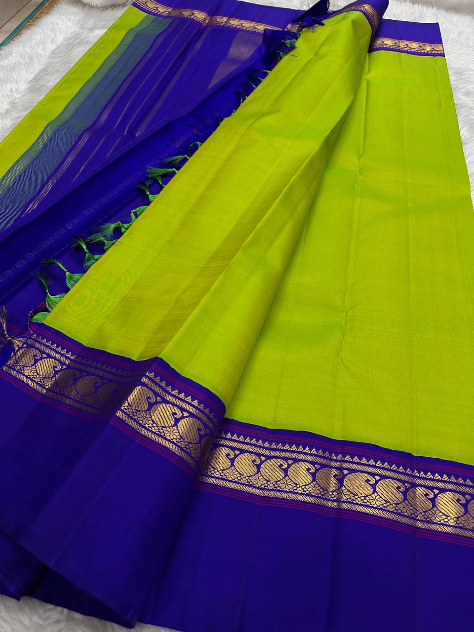 Parrot Green Handwoven Pure Silk Kanchipuram Korvai Saree with Kaal Irangiya Gold Zari Border