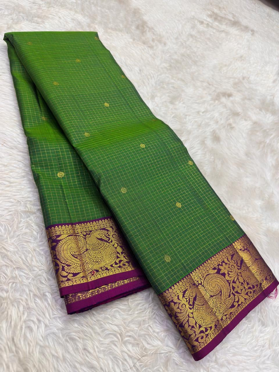 Full view of parrot green handwoven Kanchipuram pure silk saree with zari kattam and mayil border — Idam Living