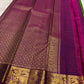 Large mayil peacock gold zari border close-up on parrot green Kanjivaram saree — Idam Living