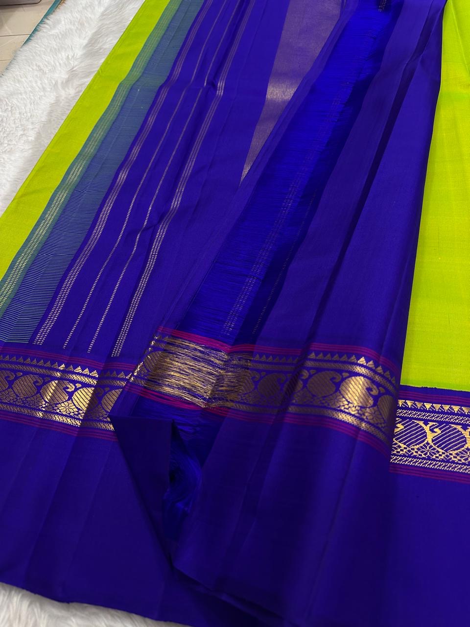 Parrot Green Handwoven Pure Silk Kanchipuram Korvai Saree with Kaal Irangiya Gold Zari Border