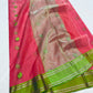 Parrot green bird motifs on coral pink silk Chanderi saree