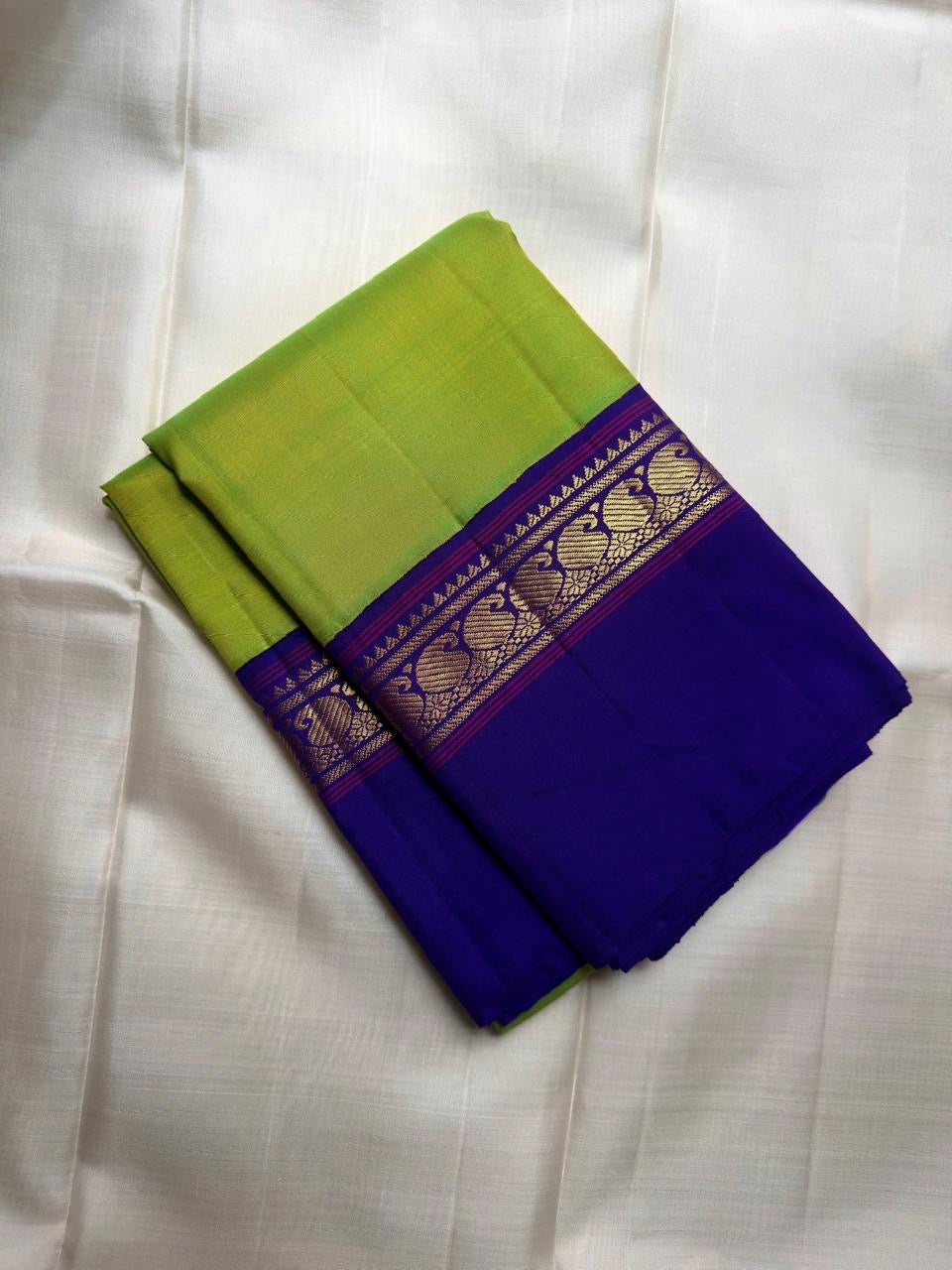 Parrot Green Handwoven Pure Silk Kanchipuram Korvai Saree with Kaal Irangiya Gold Zari Border