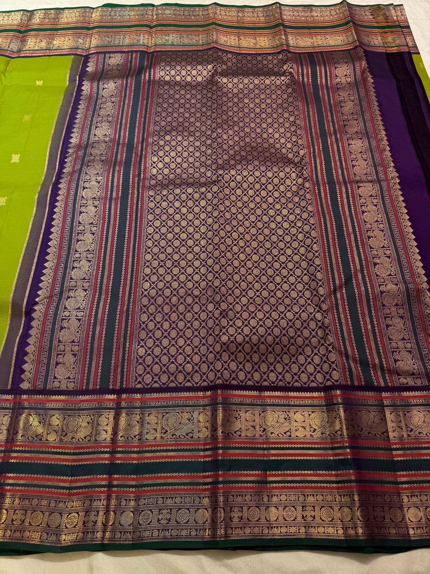 Parrot Green Handwoven Pure Silk Kanchipuram Saree with Navy Rettapet Border