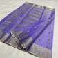 Amethyst lavender Chanderi Pattu silk saree laid open showing the ornate silver-toned paisley-vine pallu