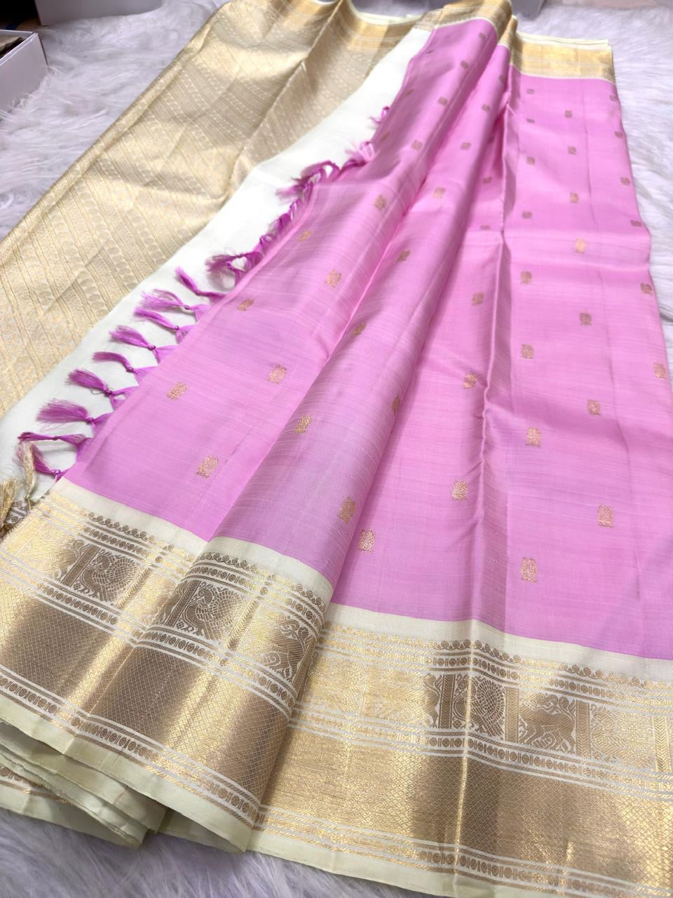 Pastel pink Handwoven Pure Silk Kanjivaram saree with kamalam buttas