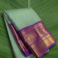 Pastel Mint Green and Royal Orchid Purple Handwoven Pure Silk Kanchipuram Saree with Vairaoosi Korvai Border and Mayil Chakram Butta