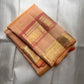 Pastel Peach Kanjeevaram silk saree, gold zari butta motif close-up — Idam Living