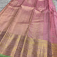 Pastel pink Kancheepuram saree with Pistachio Green contrast