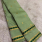 Pastel sage green Kanjeevaram silk saree body with zari pavun buttas