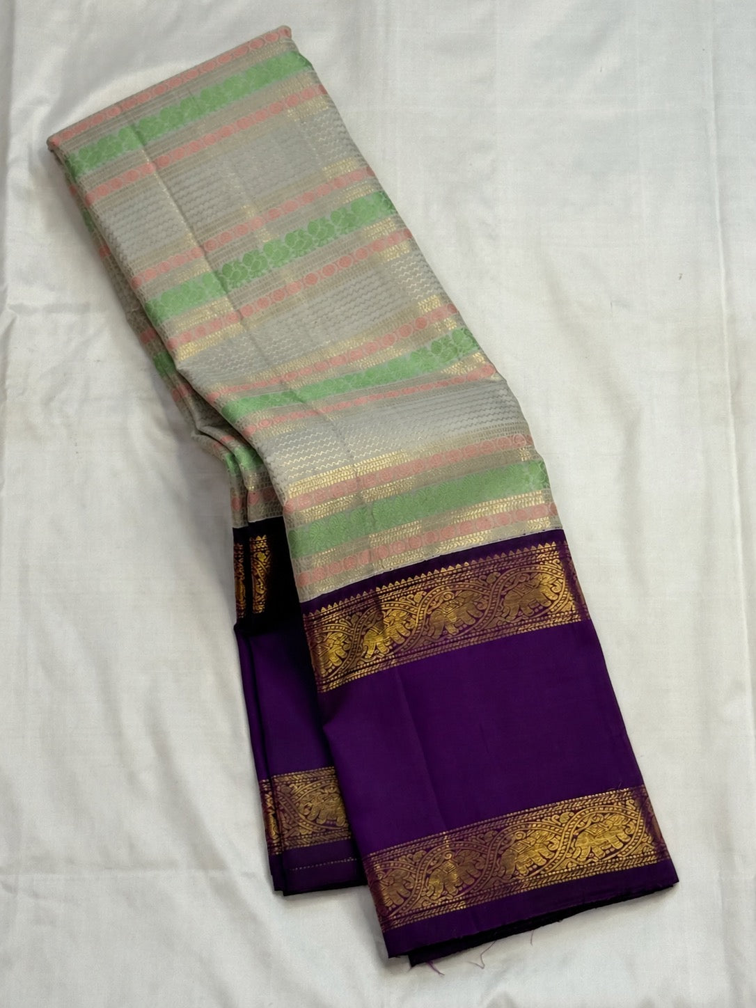 Pastel Veldhari handwoven Kanjivaram silk with peacock and Kamalam silk-thread motifs on ivory