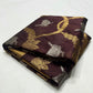 Deep Cocoa Brown Pattu Silk Chanderi saree pallu showing the broad antique-gold woven field with Cocoa Brown end panel.