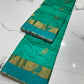 Turquoise Green Pattu Silk Chanderi saree body detail with repeated gold woven bird motifs