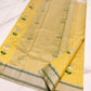 Turmeric Yellow Pattu Silk Chanderi saree body detail with silver circular floral motifs and green stems